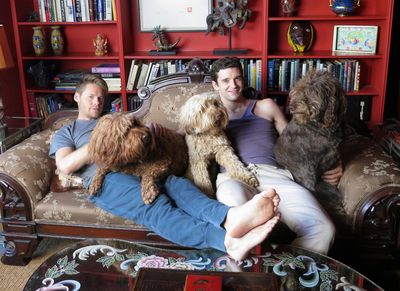 "This IS most adorable picture we've ever seen! Randy Harrison & Michael Urie & Labradoodles!" - May 25th
